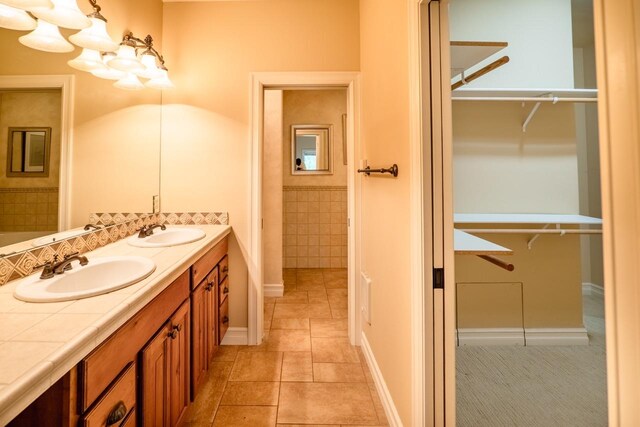 159 Fairway Blvd, Kalispell, MT 59901 - full bathroom with a spacious closet and double vanity