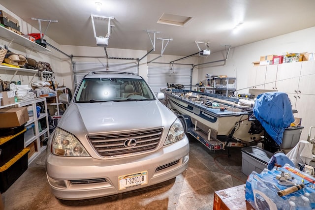 garage featuring a garage door opener