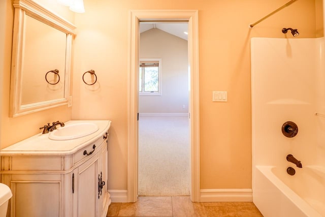 159 Fairway Blvd, Kalispell, MT 59901 - bathroom with vanity, bathtub / shower combination, vaulted ceiling, and tile patterned floors
