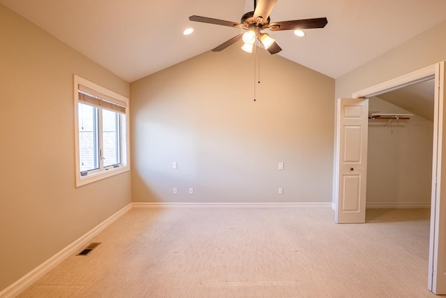 159 Fairway Blvd, Kalispell, MT 59901 - unfurnished bedroom featuring light carpet, lofted ceiling, recessed lighting, a closet, and a ceiling fan