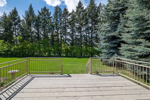 159 Fairway Blvd, Kalispell, MT 59901 - wooden deck with a lawn