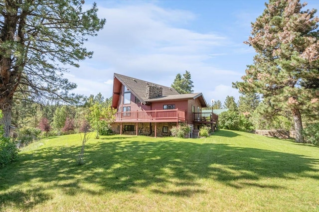 view of yard featuring a wooden deck