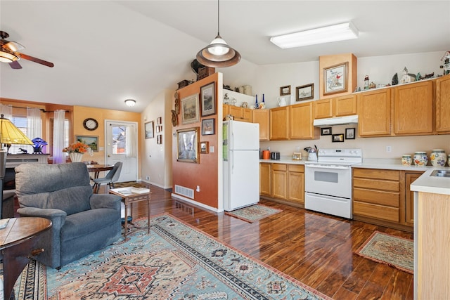 kitchen featuring under cabinet range hood, white appliances, visible vents, open floor plan, and light countertops