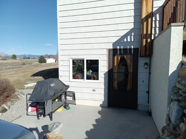 view of patio with a grill