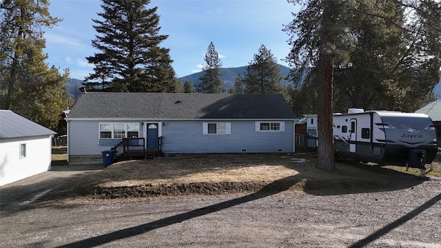 view of front facade featuring a mountain view