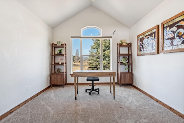 office space featuring high vaulted ceiling, carpet, and baseboards