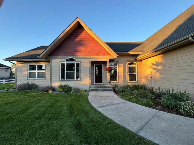 view of front of home with a front yard