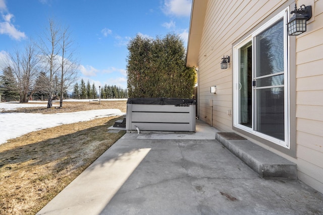 view of patio / terrace featuring a hot tub