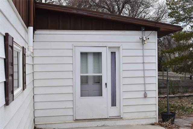 view of outbuilding featuring fence