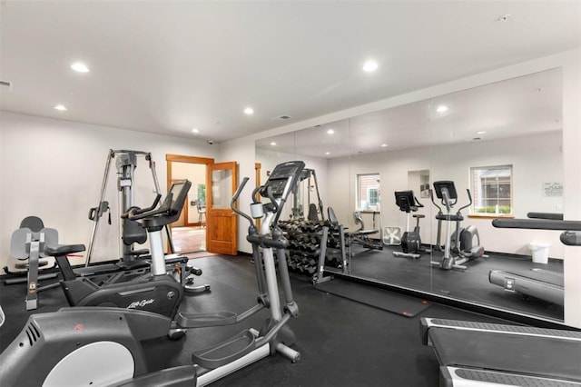 gym featuring recessed lighting