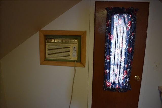 room details featuring an AC wall unit