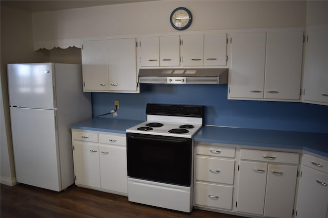 kitchen featuring extractor fan, white cabinets, freestanding refrigerator, electric range oven, and dark wood finished floors