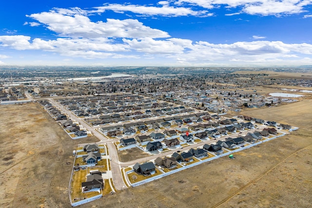 birds eye view of property with a residential view