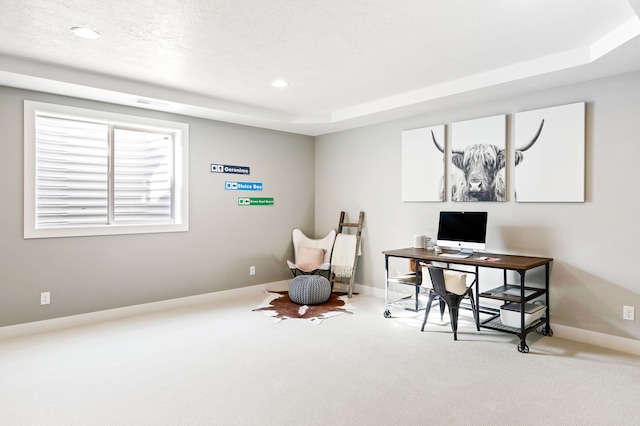 carpeted home office featuring recessed lighting, a textured ceiling, a raised ceiling, and baseboards