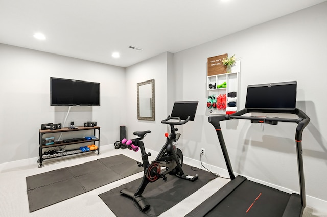 exercise area with visible vents, recessed lighting, and baseboards