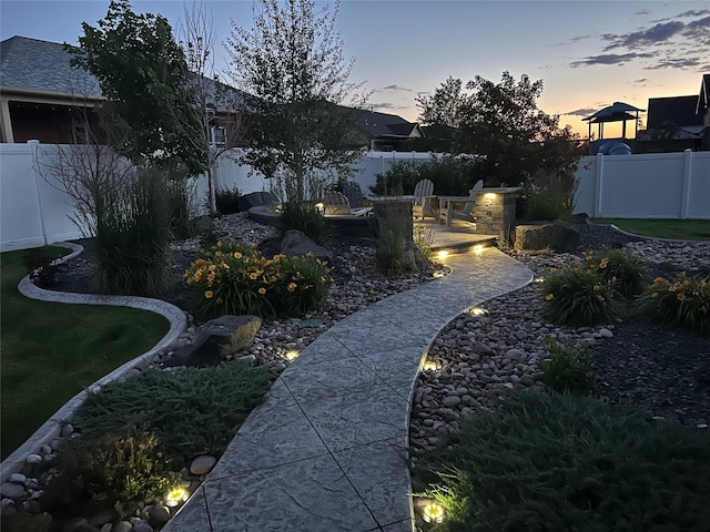 view of yard featuring a patio and a fenced backyard