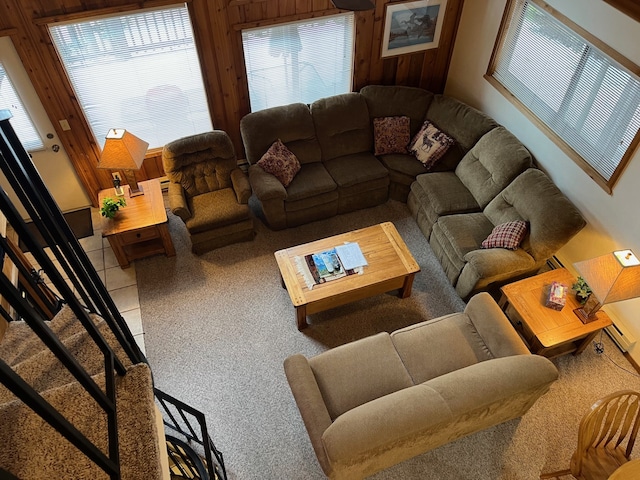 living room featuring wood walls