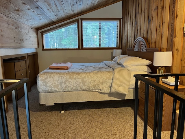 bedroom featuring multiple windows, wood ceiling, carpet, and lofted ceiling