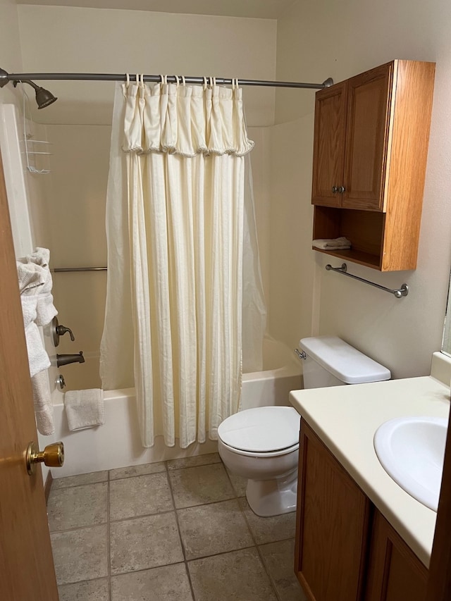 bathroom featuring tile patterned flooring, vanity, toilet, and shower / tub combo with curtain