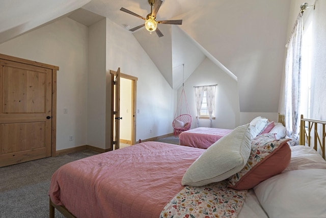 carpeted bedroom with high vaulted ceiling, a ceiling fan, and baseboards