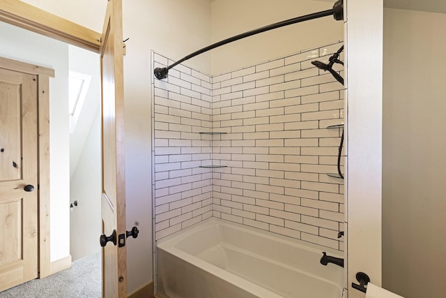 bathroom with shower / tub combination