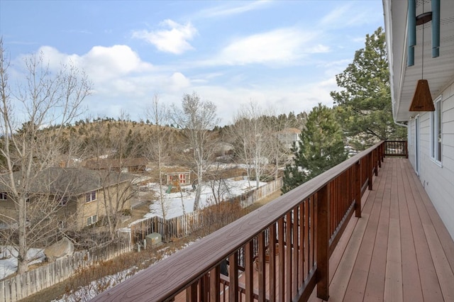 wooden deck featuring fence