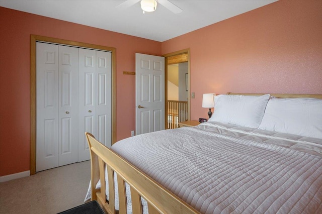 bedroom with baseboards, carpet, a closet, and ceiling fan