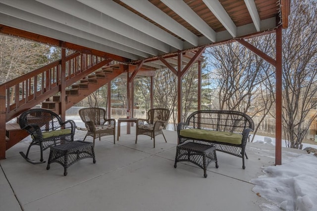 view of patio with an outdoor hangout area and stairs