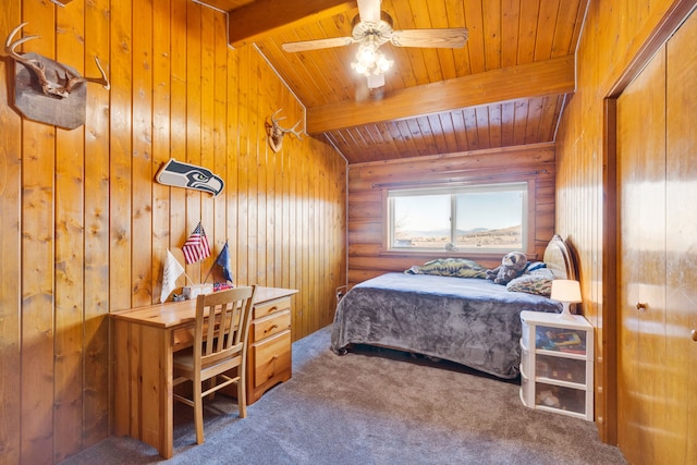 bedroom with vaulted ceiling with beams, wood ceiling, wood walls, and carpet floors