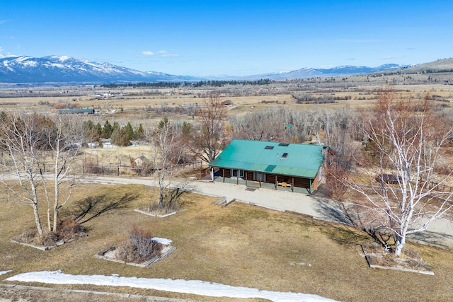 birds eye view of property featuring a mountain view