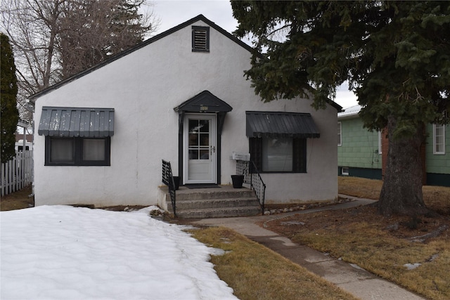 view of front facade with stucco siding