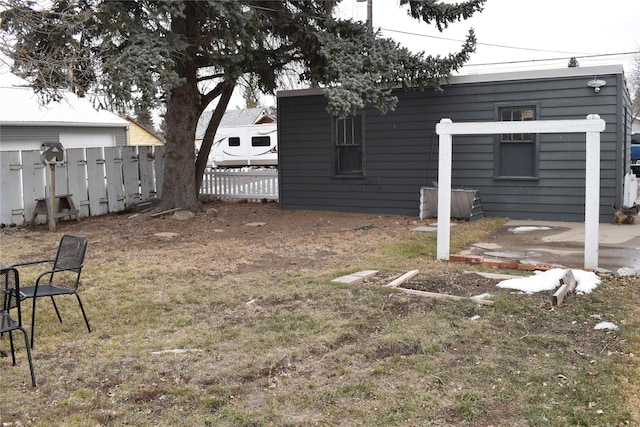 view of yard with a patio and fence