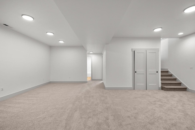 57 Hidden Cedar Loop, Columbia Falls, MT 59912 - finished below grade area featuring carpet flooring, recessed lighting, and stairs
