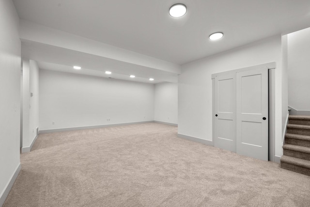 57 Hidden Cedar Loop, Columbia Falls, MT 59912 - finished below grade area featuring carpet flooring, stairway, and recessed lighting