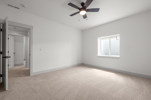 57 Hidden Cedar Loop, Columbia Falls, MT 59912 - empty room with light colored carpet, a ceiling fan, and a smoke detector