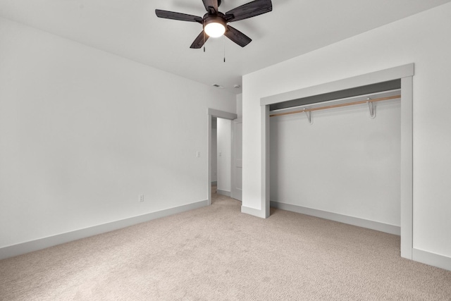 57 Hidden Cedar Loop, Columbia Falls, MT 59912 - unfurnished bedroom featuring carpet flooring, a closet, and ceiling fan