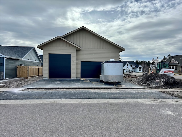 exterior space with an outbuilding and fence