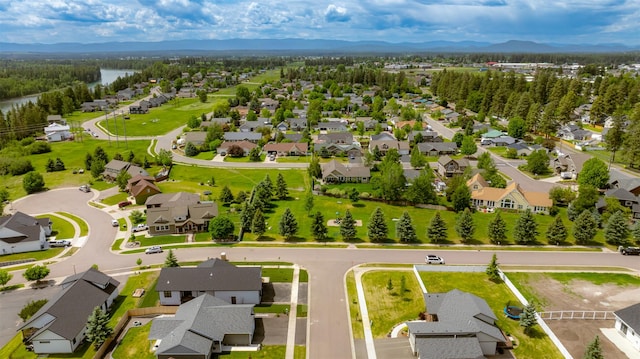 57 Hidden Cedar Loop, Columbia Falls, MT 59912 - aerial perspective of suburban area with a mountain backdrop