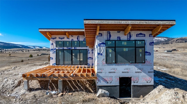 exterior space with a mountain view