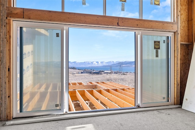 entryway with a healthy amount of sunlight and a mountain view