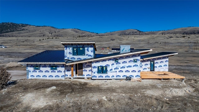 property in mid-construction with a mountain view