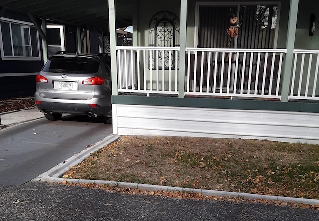 exterior space featuring an attached carport