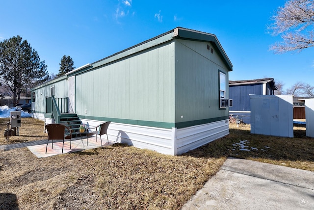 view of property exterior featuring a patio