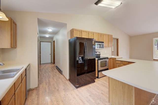 kitchen with light wood finished floors, a baseboard radiator, a sink, vaulted ceiling, and appliances with stainless steel finishes