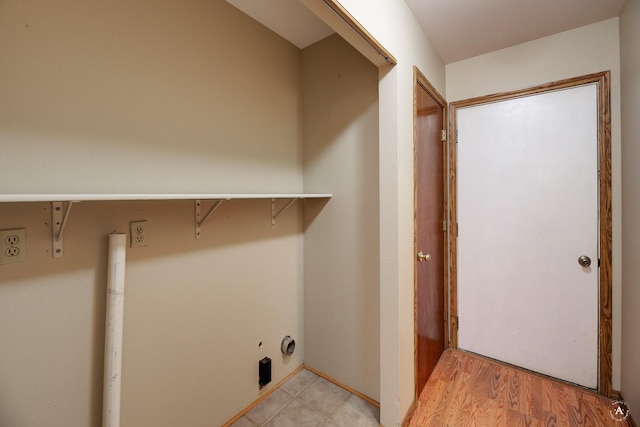 laundry room featuring laundry area and light wood finished floors