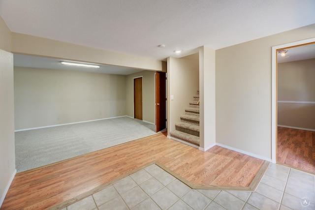 6520 Canyon Ferry Rd, Helena, MT 59602 - finished basement featuring light wood-type flooring and stairs