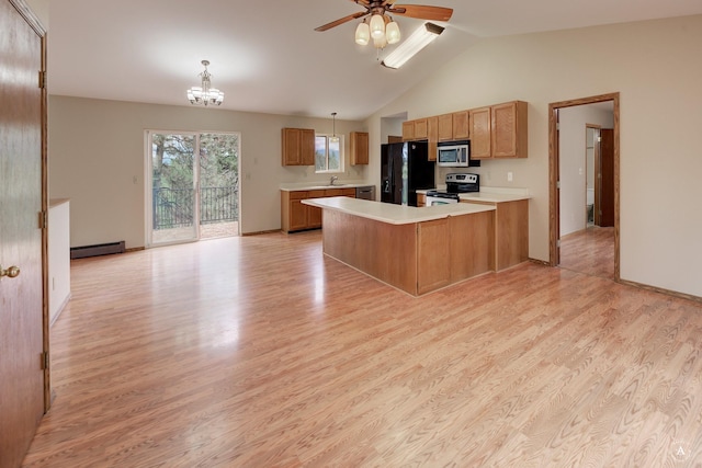 6520 Canyon Ferry Rd, Helena, MT 59602 - kitchen featuring stainless steel appliances, a baseboard radiator, light countertops, a peninsula, and light wood-style floors
