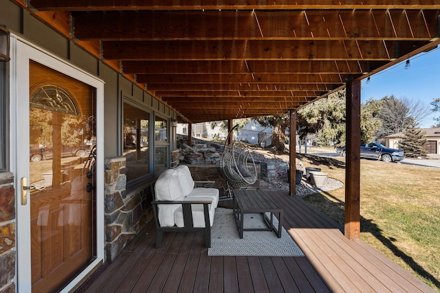 wooden terrace with a yard