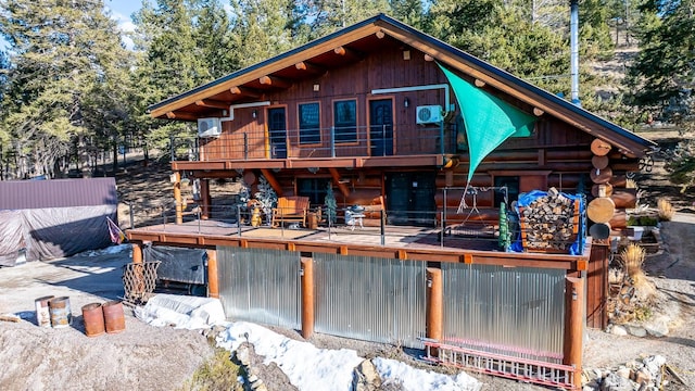 view of front of house with log exterior