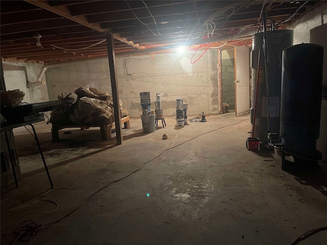 unfinished basement with water heater